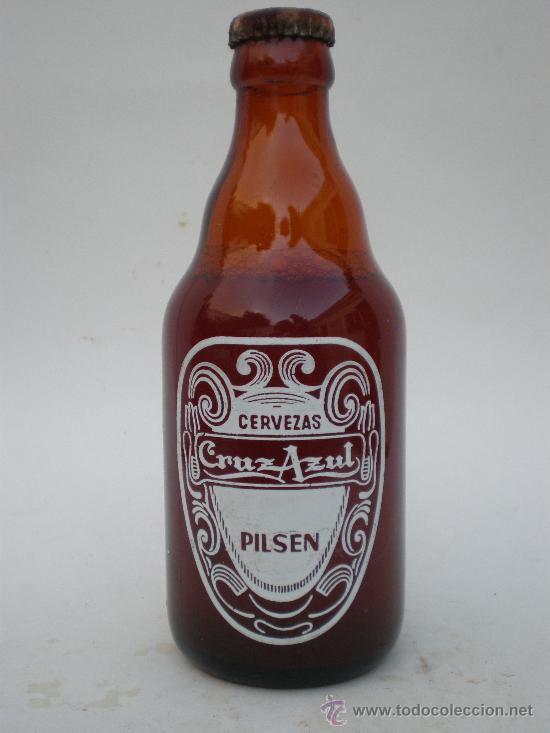 Botellas antiguas: Botella cerveza *CRUZ AZUL* PILSEN, 33 CL. -MOD.1- LETRA G&Oacute;TICA, LLENA SIN DESTAPAR, PAMPLONA, srg.