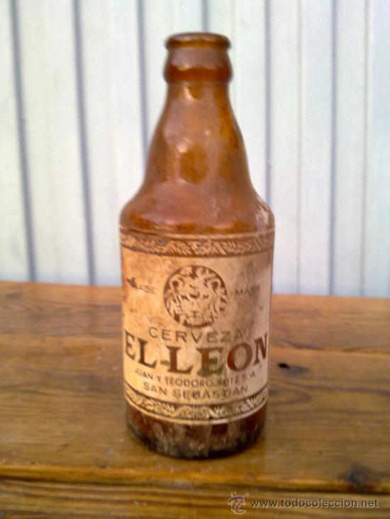 Botellas antiguas: BOTELLA DE CERVEZA SERIGRAFIADA, EL LEON. - Foto 1