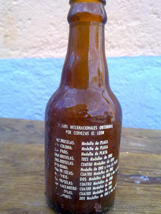 Botellas antiguas: BOTELLA DE CERVEZA EL LEON, SERIGRAFIADA. 1/5 - Foto 2