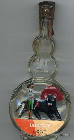 Botellas antiguas: BOTELLA DE BRANDY ESCAT EN FORMA DE GUITARRA - Foto 1