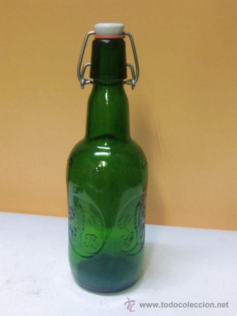 Botellas antiguas: Botella de cristal marca Grolsch - Foto 1