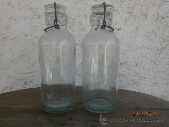 Botellas antiguas: 2 BOTES HERMETIC LETRAS EN RELIEVE CERCA DE LA BASE - Foto 1