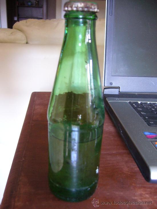 Botellas antiguas: Botella Seven UP. A medias. Cerrada - Foto 1