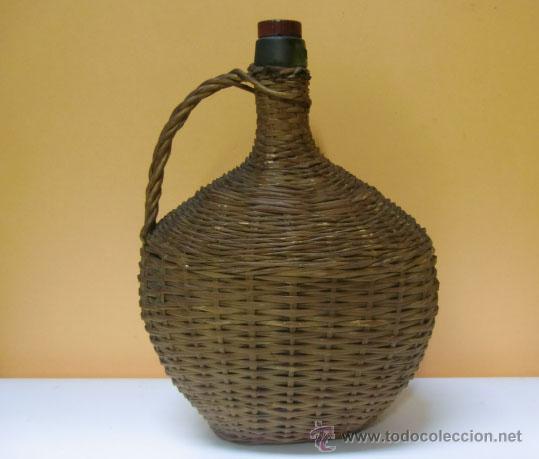 Botellas antiguas: Botella ovalada forrada de mimbre, de Moscatell - Foto 2