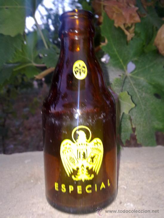 Botellas antiguas: botella de cerveza el aguila 1/5. - Foto 1