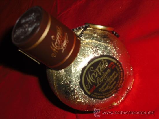 Botellas antiguas: BOTELLA MINIATURA LICOR MOZART - Foto 1