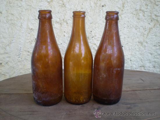 Botellas antiguas: 3 BOTELLAS CERVEZA EL AGUILA - Foto 1
