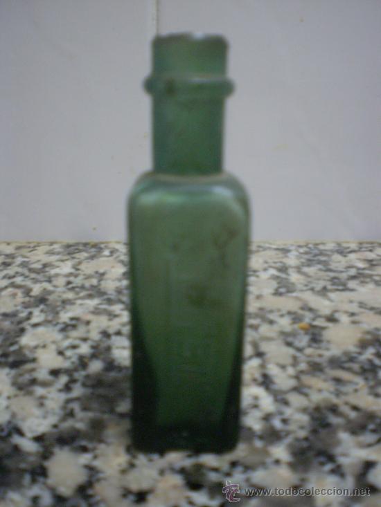 Botellas antiguas: ANTIGUA BOTELLITA DE NETOL RELIEVE - Foto 1