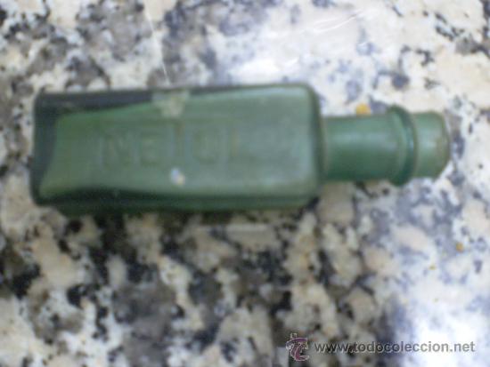 Botellas antiguas: ANTIGUA BOTELLITA DE NETOL RELIEVE - Foto 2
