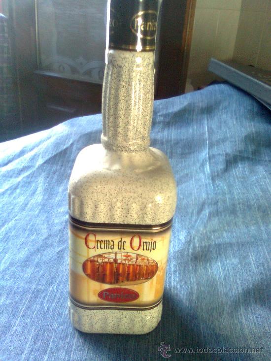 Botellas antiguas: Botella crema de orujo de la casa panizo - Foto 1