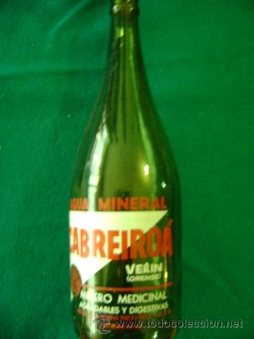 Botellas antiguas: Botella de litro serigrafiada Cabreiro&aacute; Ver&iacute;n - Foto 1