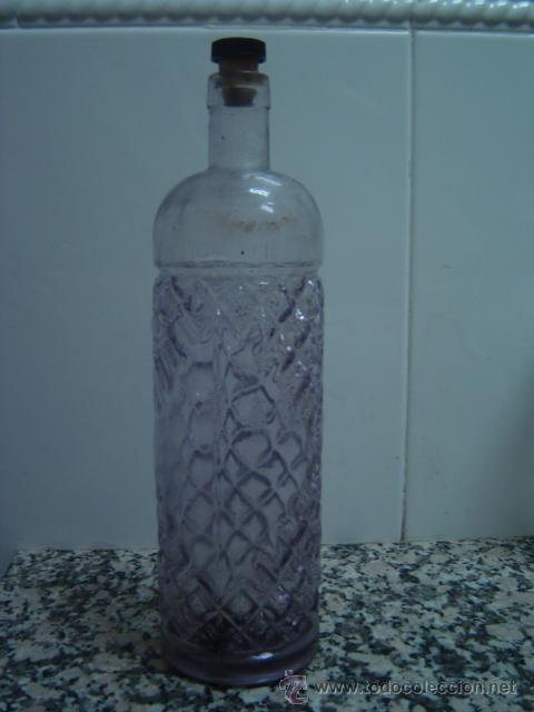 Botellas antiguas: BOTELLA ANIS DEL LOBO LETRAS EN RELIEVE - Foto 1