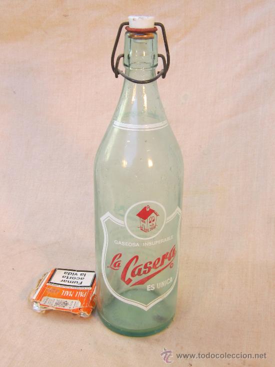Botellas antiguas: BOTELLA DE GASEOSA LA CASERA - Foto 1
