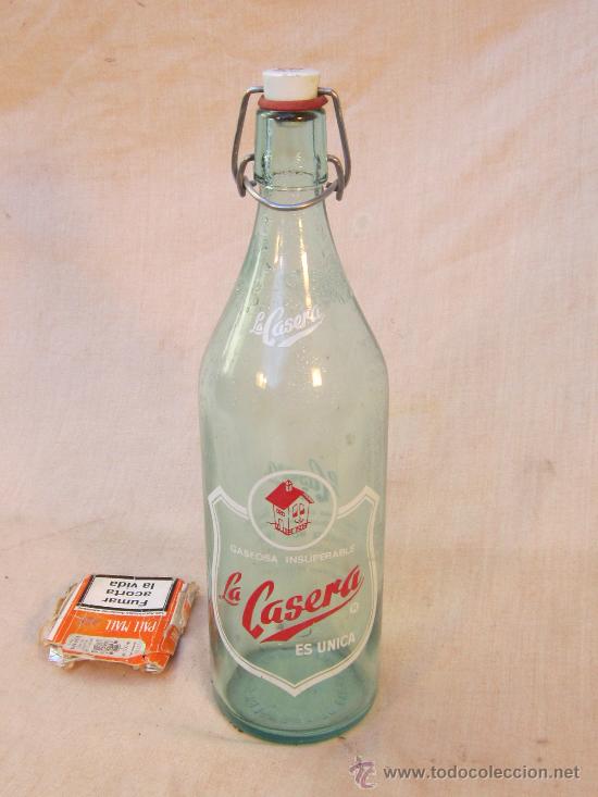 Botellas antiguas: BOTELLA DE GASEOSA LA CASERA - Foto 1