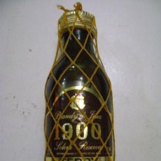 Botellas antiguas: BOTELLÍN MINIATURA 1900 BRANDY DE JEREZ SOLERA RESERVA TERRY, LLENA, DE PLÁSTICO. Lote 90949138