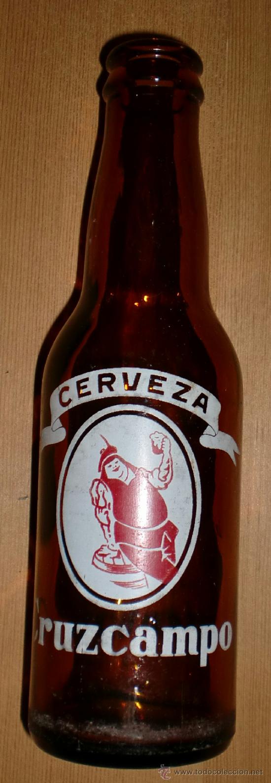 Botellas antiguas: Quinto de cerveza cruzcampo - Foto 1