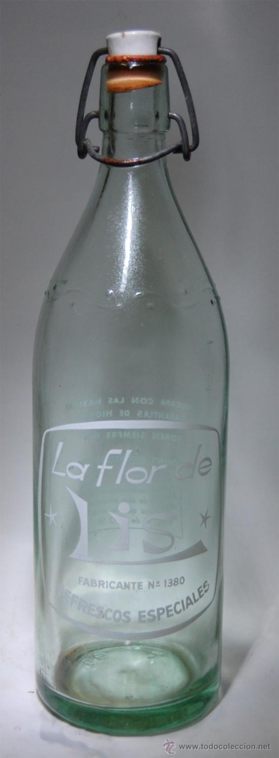 Botellas antiguas: BOTELLA DE GASEOSA FLOR DE LIS 1LITRO - Foto 1