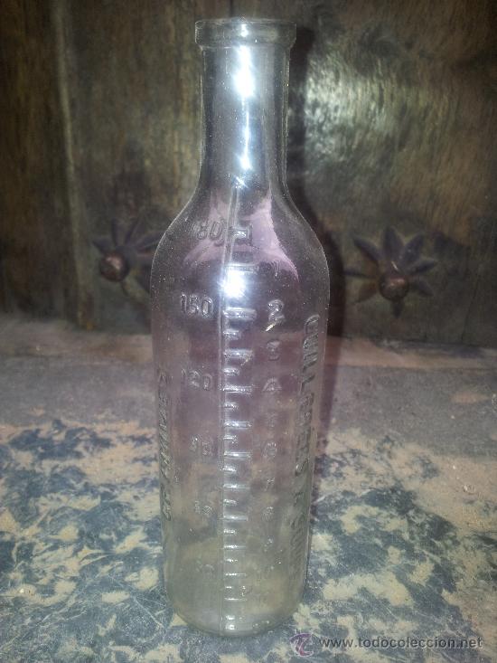 Botellas antiguas: botella con letras y medidas en relieve - Foto 2