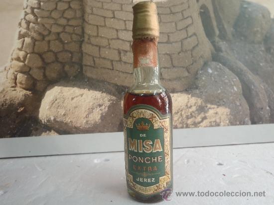 Botellas antiguas: BOTELLIN DE MISA PONCHE EXTRA - Foto 1