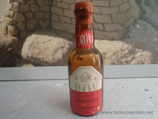 Botellas antiguas: BOTELLIN RON MONTA&Ntilde;A - Foto 1