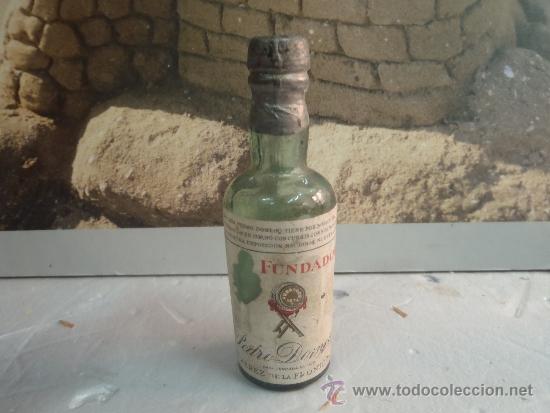 Botellas antiguas: BOTELLIN FUNDADOR - Foto 1