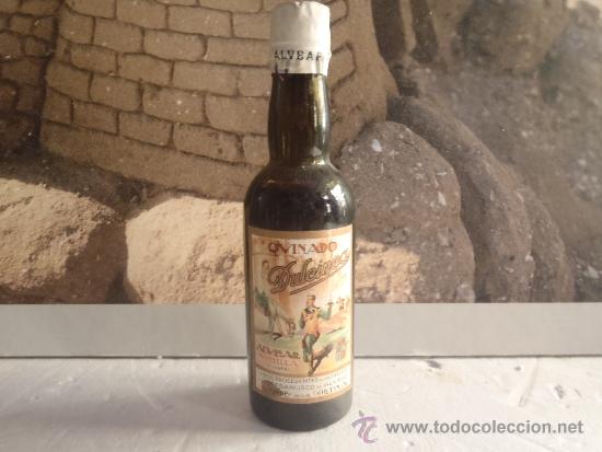 Botellas antiguas: BOTELLIN QUINADO DULCINEA - Foto 1