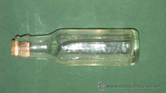 Botellas antiguas: PEQUE&Ntilde;A BOTELLA DE ELIXIR ESTOMACAL SAIZ DE CARLOS - Foto 2