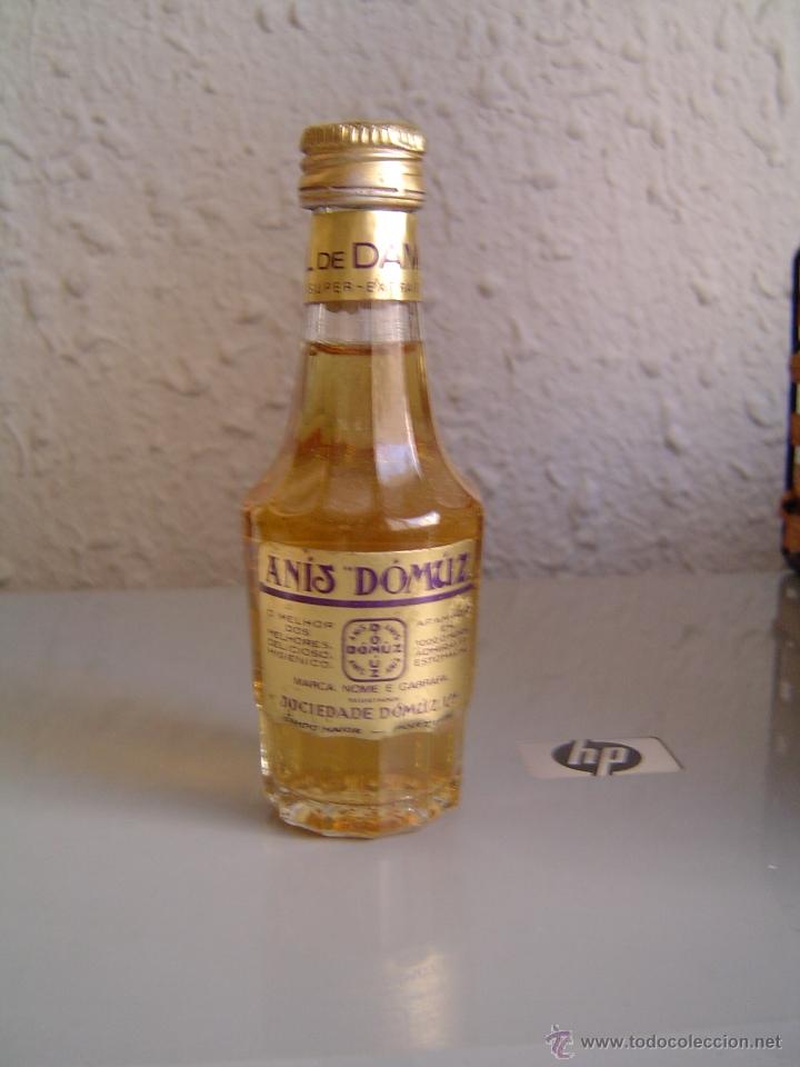 Botellas antiguas: Botellin Anis Domuz - Foto 1