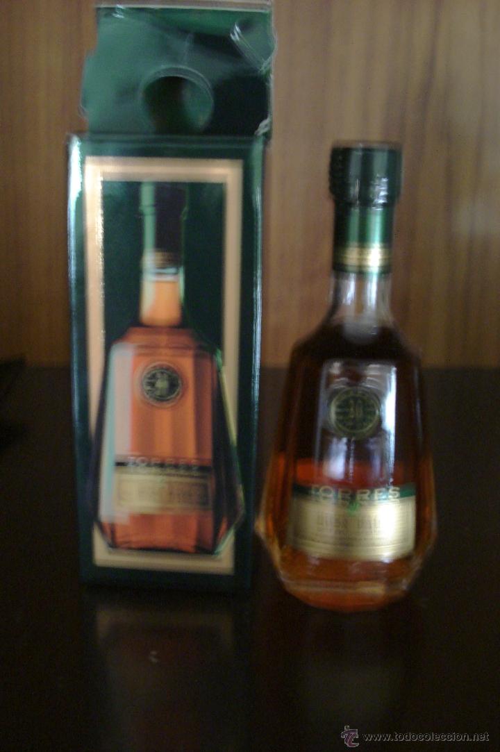 Botellas antiguas: Botellin co&ntilde;ac Torres - Foto 1
