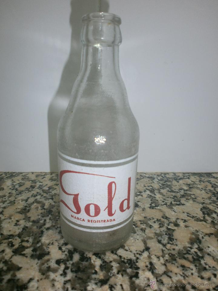 Botellas antiguas: BOTELLIN DE REFRESCO GOLD - Foto 1