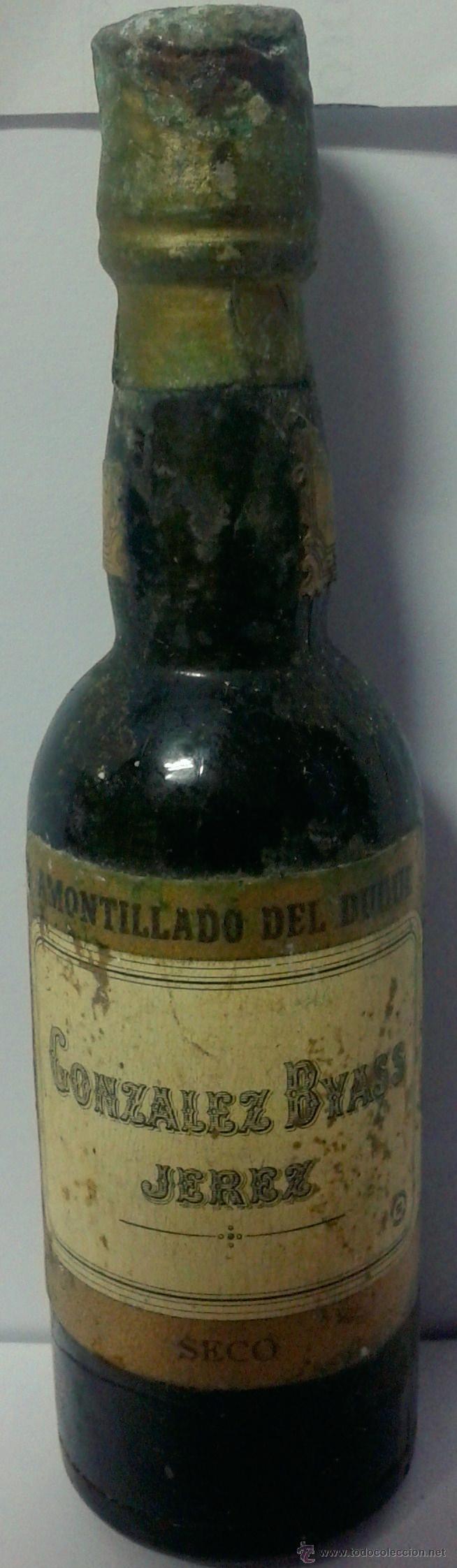 Botellas antiguas: MINI BOTELLA-AMONTILLADO- DE GONZALEZ BYASS - Foto 1