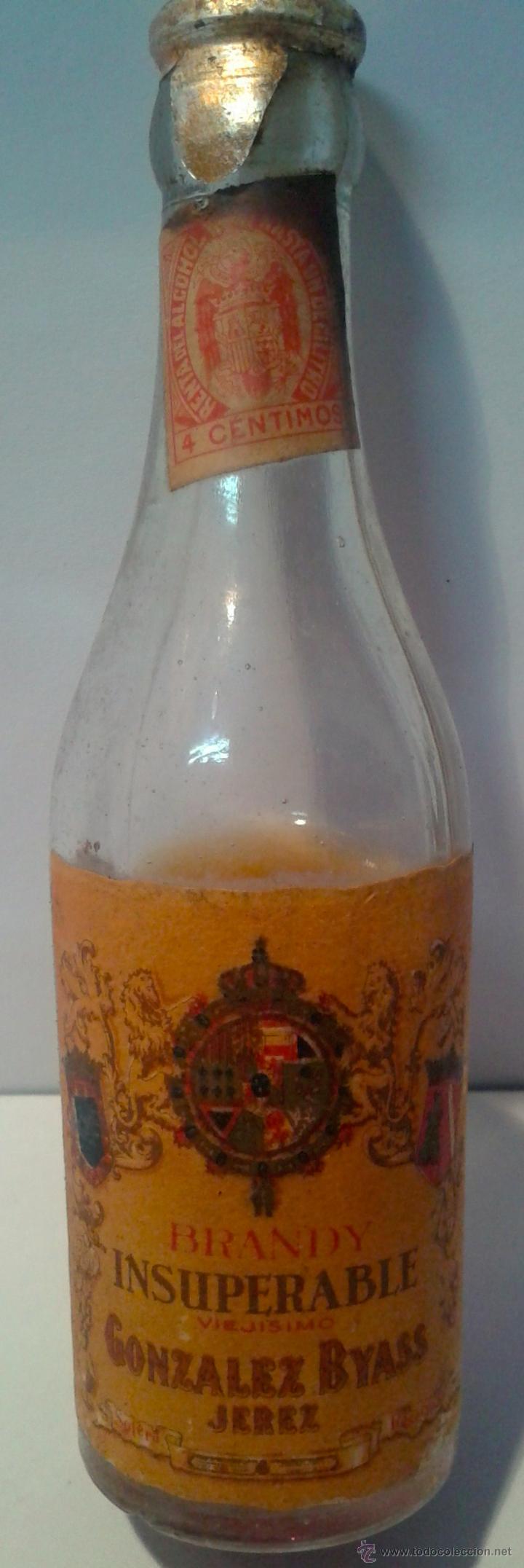 Botellas antiguas: MINI BOTELLA-BRANDY INSUPERABLE- DE GONZALEZ BYASS- - Foto 1