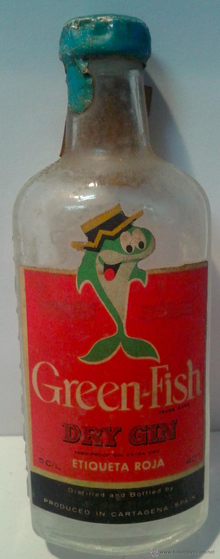 Botellas antiguas: MINI BOTELLA-GREEN-FISH-ANTIGUA- - Foto 1