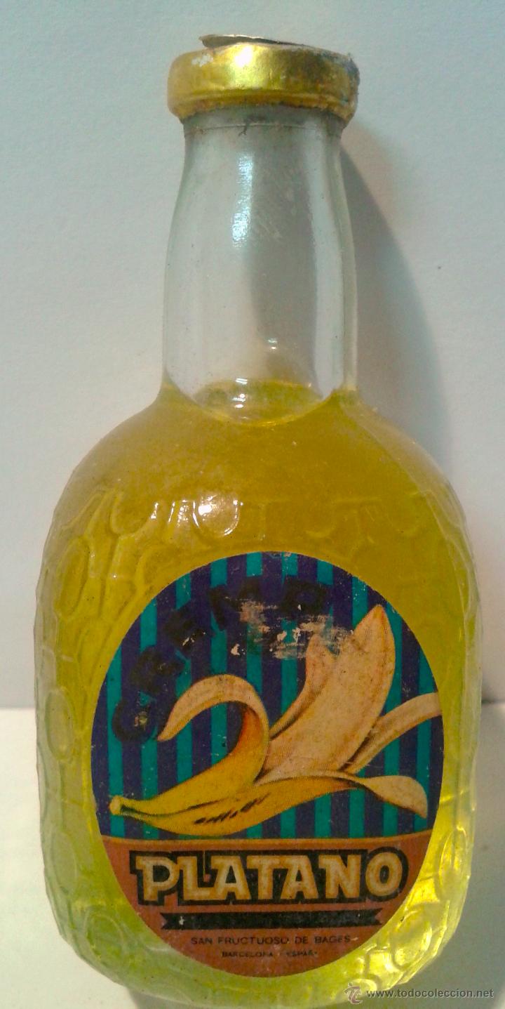 Botellas antiguas: MINI BOTELLA-LICOR DE PLATANO- - Foto 1