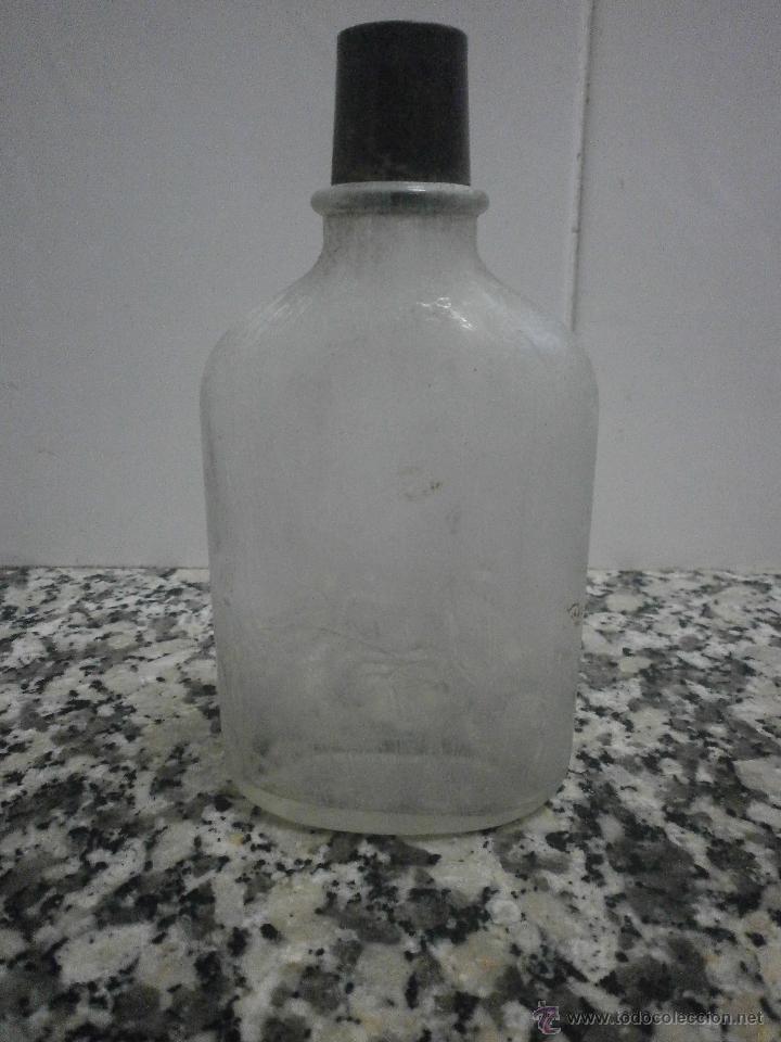 Botellas antiguas: BOTELLA FLOID RELIEVE EN LA BASE - Foto 1