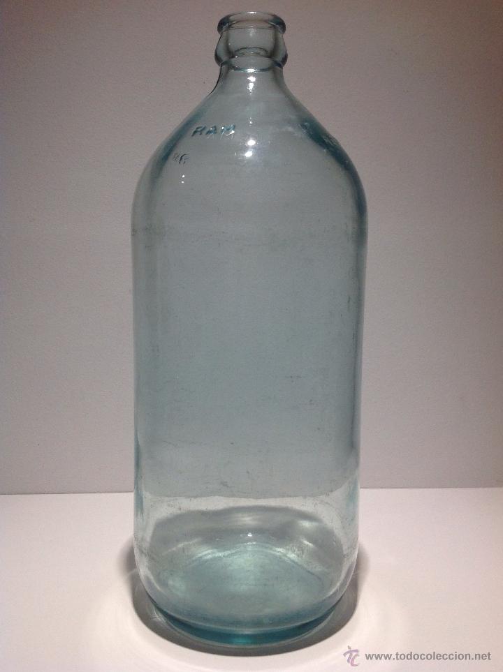 Botellas antiguas: ANTIGUA BOTELLA DE LECHE RAM,LETRAS EN RELIEVE - Foto 1