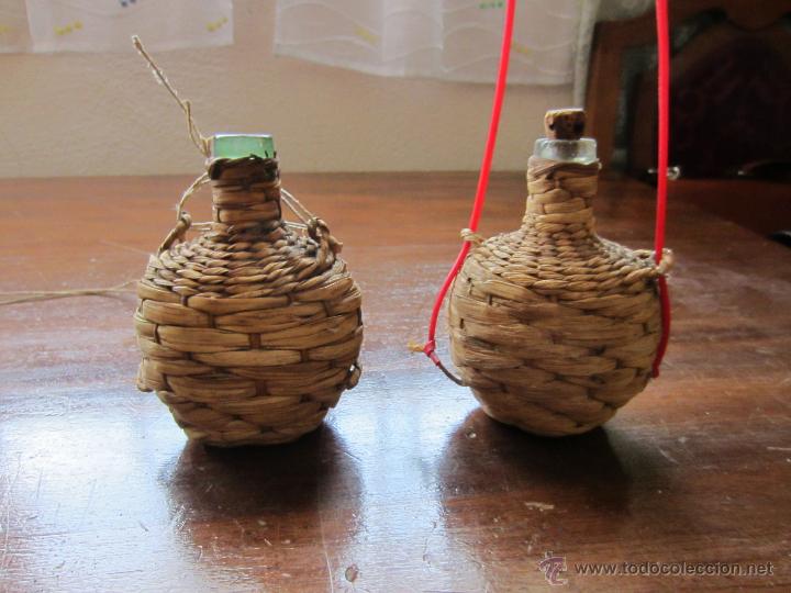 Botellas antiguas: garrafa forrada de enea - Foto 1