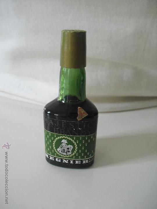 Bouteilles anciennes: Regnier Majestic Cura&ccedil;ao Especial al Brandy. Mini botella, botellin miniatura Botellita. Minibotella