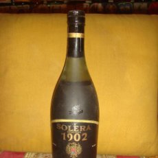 Botellas antiguas: ANTIGUO BRANDY “SOLERA 1902”, GRAN RESERVA. LLENA Y SIN ABRIR. TAPÓN CORCHO. C1970.. Lote 43438636