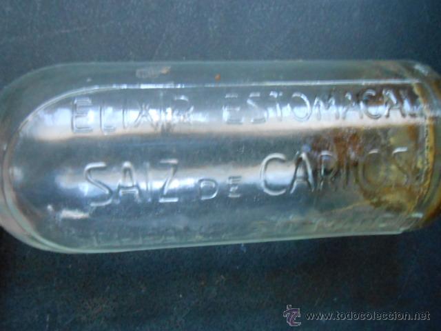 Botellas antiguas: ANTIGUA BOTELLA ELIXIR ESTOMACAL SAIZ DE CARLOS - Foto 1