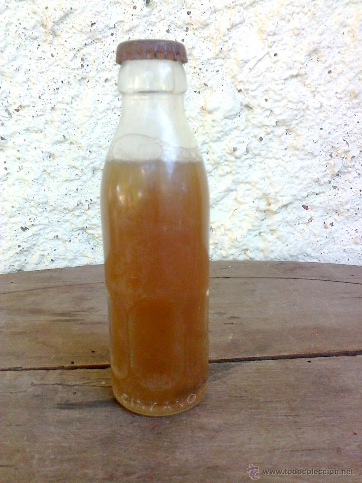 Botellas antiguas: BOTELLIN CINZANO LETRAS EN RELIEVE CERCA DE LA BASE - Foto 1