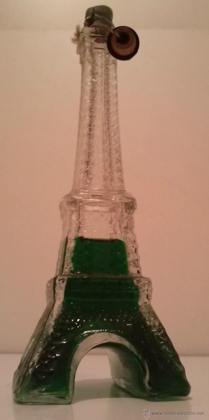 Botellas antiguas: PRECIOSA BOTELLITA DE AVON - FORMA DE LA TORRE EIFFEL - Foto 2