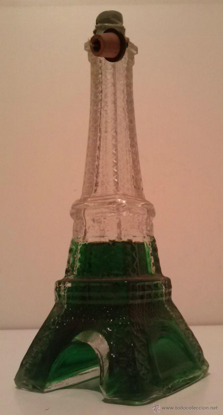 Botellas antiguas: PRECIOSA BOTELLITA DE AVON - FORMA DE LA TORRE EIFFEL - Foto 3