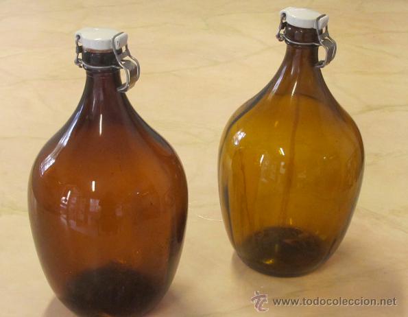 Botellas antiguas: 2 botellas de vidrio &aacute;mbar - Foto 1