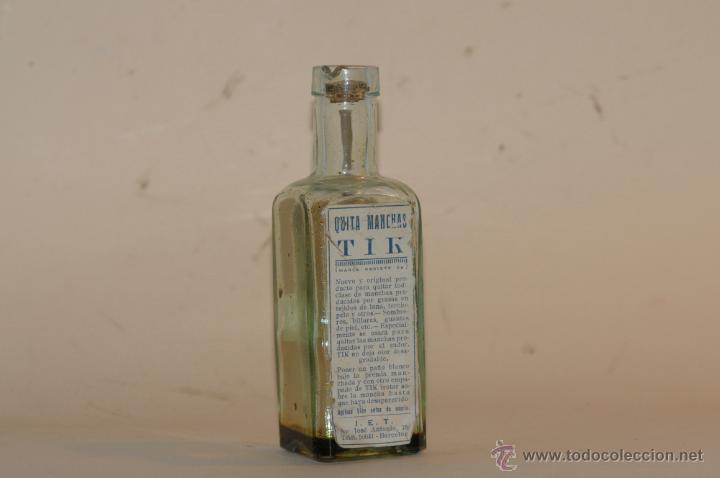 Botellas antiguas: BOTELLA QUITA MANCHAS TIK - Foto 1