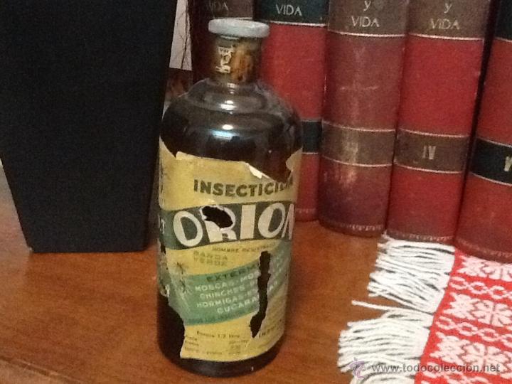 Botellas antiguas: Orion, insecticida botella cerrada - Foto 1