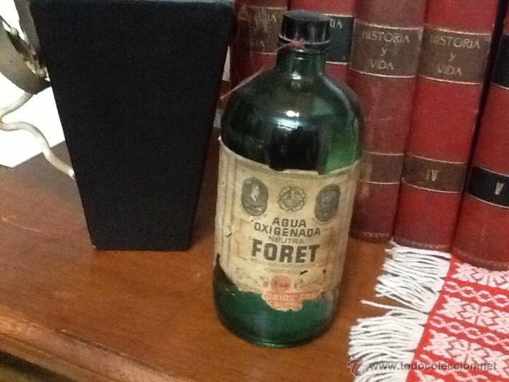 Botellas antiguas: Agua oxigenada forget , sin abrir - Foto 1
