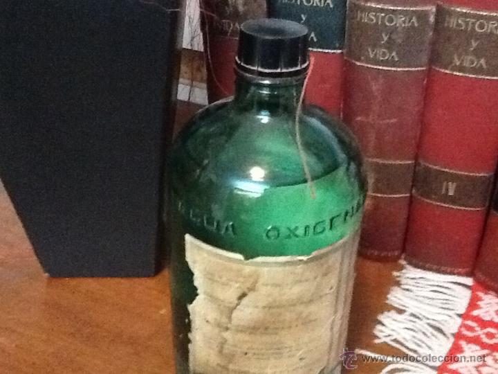 Botellas antiguas: Agua oxigenada forget , sin abrir - Foto 2