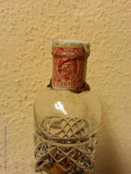 Botellas antiguas: MINI BOTELLA DE ANIS LARIOS (PRECINTADA) 11 CTMS - Foto 3