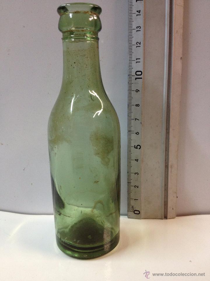 Botellas antiguas: BOTELLA MINI CURIOSA PUEDE DE VINO - Foto 1
